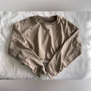 Beige cropped gymshark sweater
